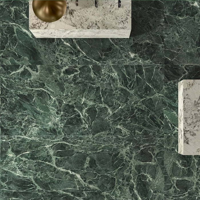 Bathroom interior featuring Verde Apia Polished Green Marble effect 60 × 60cm porcelain wall and floor tiles, styled with a floating vanity, brass basin, and rich green tones with intricate natural veining.