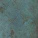 Close-up of Verde Patterns Copper Oxide 60cm x 60cm metallic effect porcelain tile, featuring an etched Art Deco-inspired fan pattern in rich blue-green tones for contemporary statement wall and floor designs.