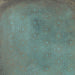 Close-up of Verde Patterns Copper Oxide 60cm x 60cm metallic effect porcelain tile, featuring an etched Art Deco-inspired fan pattern in rich blue-green tones for contemporary statement wall and floor designs.