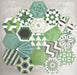 Fayrouz Verde Hexagon Patchwork Moroccan-style porcelain tiles in an 18.7 × 21.6cm hexagon format, showcasing a coordinated mix of geometric, starburst and zigzag patterns in layered green, sage, mint and charcoal tones, arranged as a decorative patchwork group to highlight colour variation and pattern diversity.