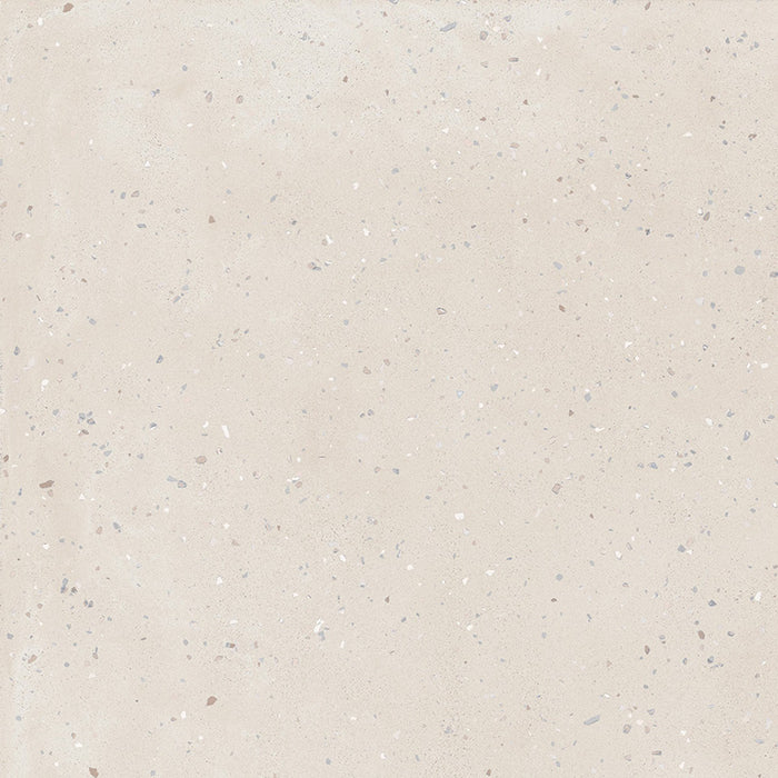 Close-up of Verona Micro Sand concrete effect porcelain tile featuring a warm sand-coloured surface with subtle terrazzo-inspired flecks and a contemporary matt finish, ideal for modern walls and floors.