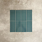 Close-up of Pimlico River Blue 7.5 × 15cm ceramic tiles with a crackle glaze finish, highlighting rich blue tones, subtle surface texture and a classic rectangular format for wall applications.