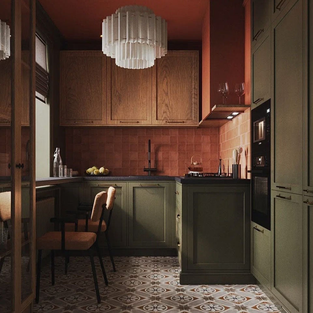 Kitchen featuring Viscount Heythrop 20x20cm Victorian-style wall and floor tiles in warm brown and cream tones, styled with olive green cabinetry, terracotta wall tiles, dark wood finishes, and ambient lighting.