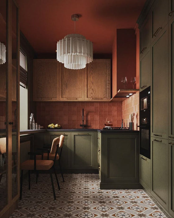 Kitchen featuring Viscount Heythrop 20x20cm Victorian-style wall and floor tiles in warm brown and cream tones, styled with olive green cabinetry, terracotta wall tiles, dark wood finishes, and ambient lighting.
