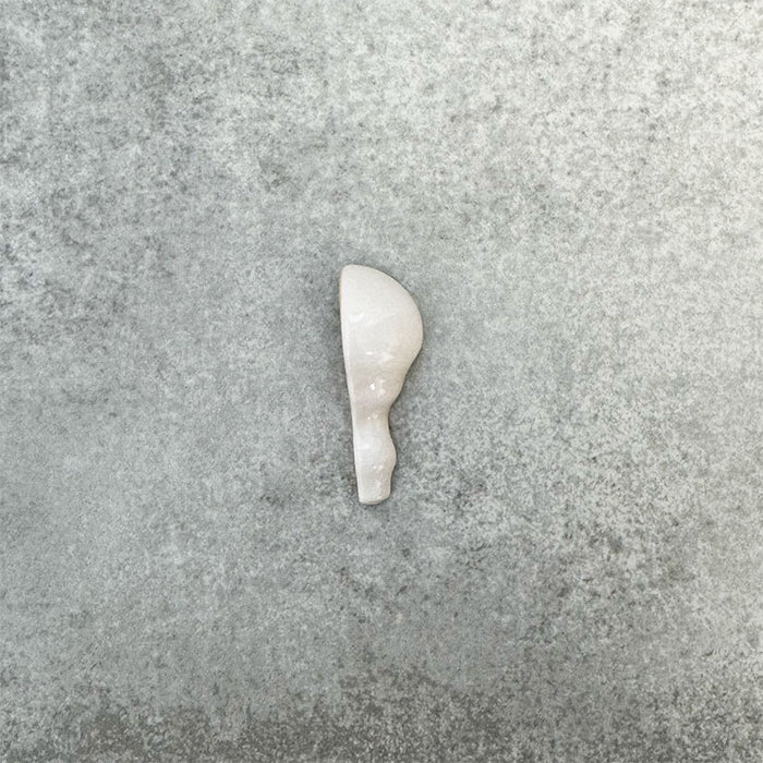 Pimlico White external corner tile with a crackle glaze finish, featuring soft white tones and a shaped ceramic profile designed to neatly finish and protect external wall tile edges.