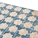 Close-up of Zanzibar Moroccan Arena Blue wall tiles, featuring a blue and cream Moroccan style geometric star pattern with a softly aged finish, ideal for creating decorative kitchen and bathroom feature walls.