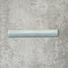 Zellige Aqua 3×20cm Moroccan-style ceramic bullnose tile, showcasing the rounded edge profile, glossy blue-green glaze and subtle tonal variation on a neutral background.