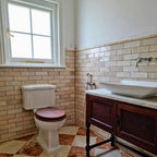 Zellige Bone Moroccan-style brick tiles in a bathroom, laid in a classic horizontal layout with warm neutral tones.