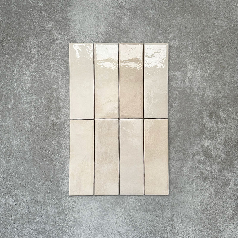 Zellige Bone Moroccan-style brick tiles in a warm beige tone, shown in a simple horizontal layout.