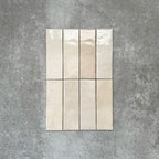 Zellige Bone Moroccan-style brick tiles in a warm beige tone, shown in a simple horizontal layout.