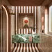 Bathroom featuring Zellige Bone Square 13.2cm x 13.2cm Moroccan-style wall tiles, paired with striped cotto and white floor tiles, a green marble vanity, brass fixtures and warm terracotta tones.