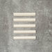 Zellige Chalk White Moroccan-style bullnose tiles in a 3 × 20cm format, shown in a soft matt ceramic finish.