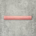 Zellige Rose Pink Bullnose 3 × 20cm Moroccan-style ceramic trim tiles in soft blush and dusty pink tones, shown with a smooth rounded edge and subtle glaze variation, arranged on a textured grey background to highlight the handcrafted zellige-effect finish and decorative edging profile.
