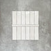 Zellige White Moroccan-style ceramic brick tiles with matching 3 × 20cm bullnose trim, shown in a clean, glossy white finish.