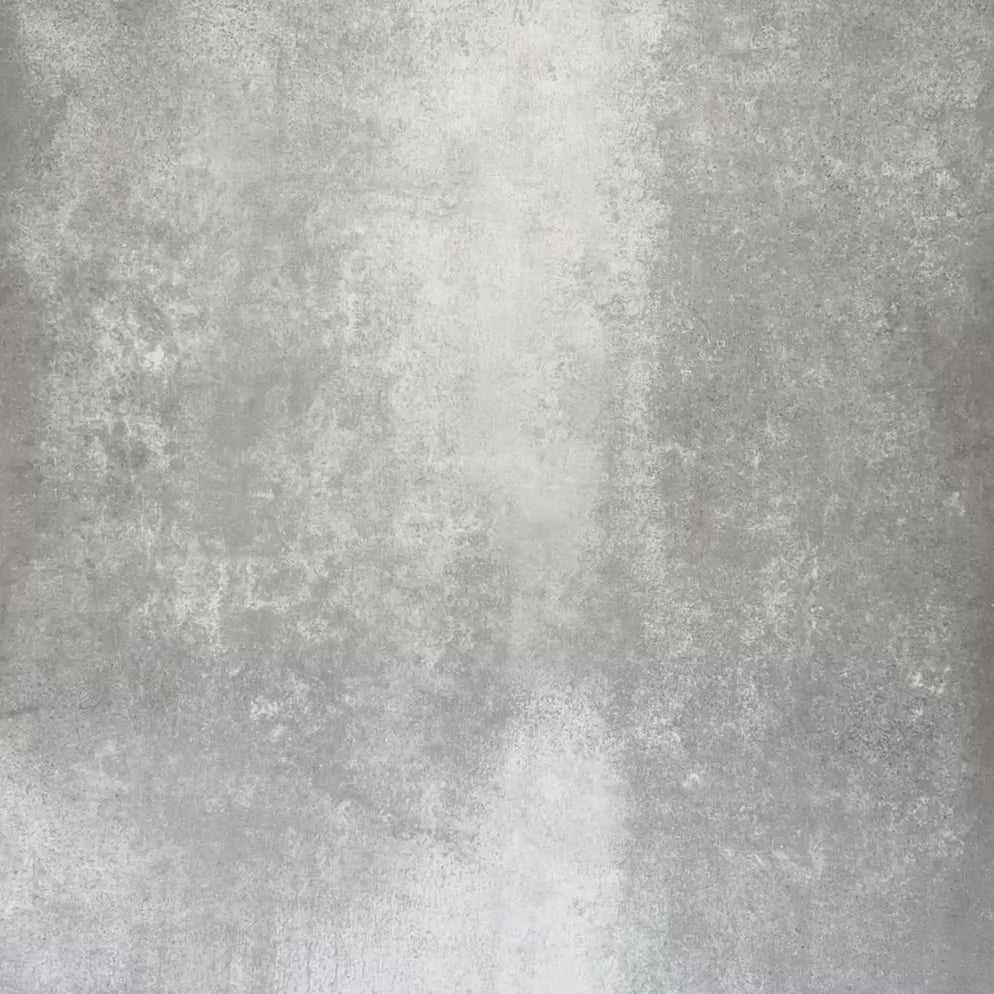 Video showcasing Lisbon Grey 5cm x 30cm artisanal porcelain wall tiles being arranged by hand, highlighting the slim brick format, warm grey and taupe tones and handcrafted-effect surface variation.