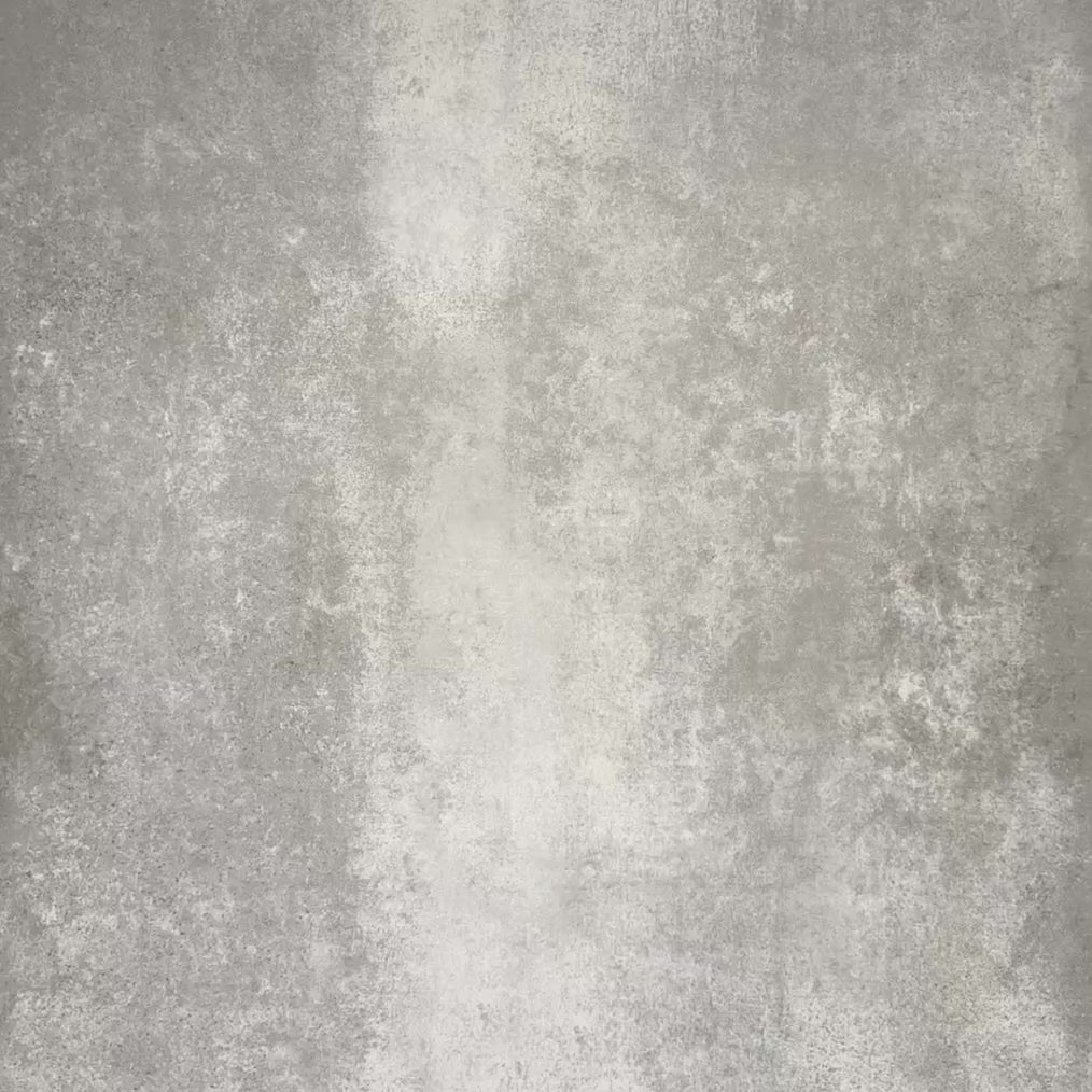 Video showcasing Zellige Oyster Square Moroccan-style ceramic tiles in a 10 × 10cm format, showcasing softly uneven edges, subtle surface ripples and gentle tonal variation that highlight the handcrafted character of the glossy oyster glaze.