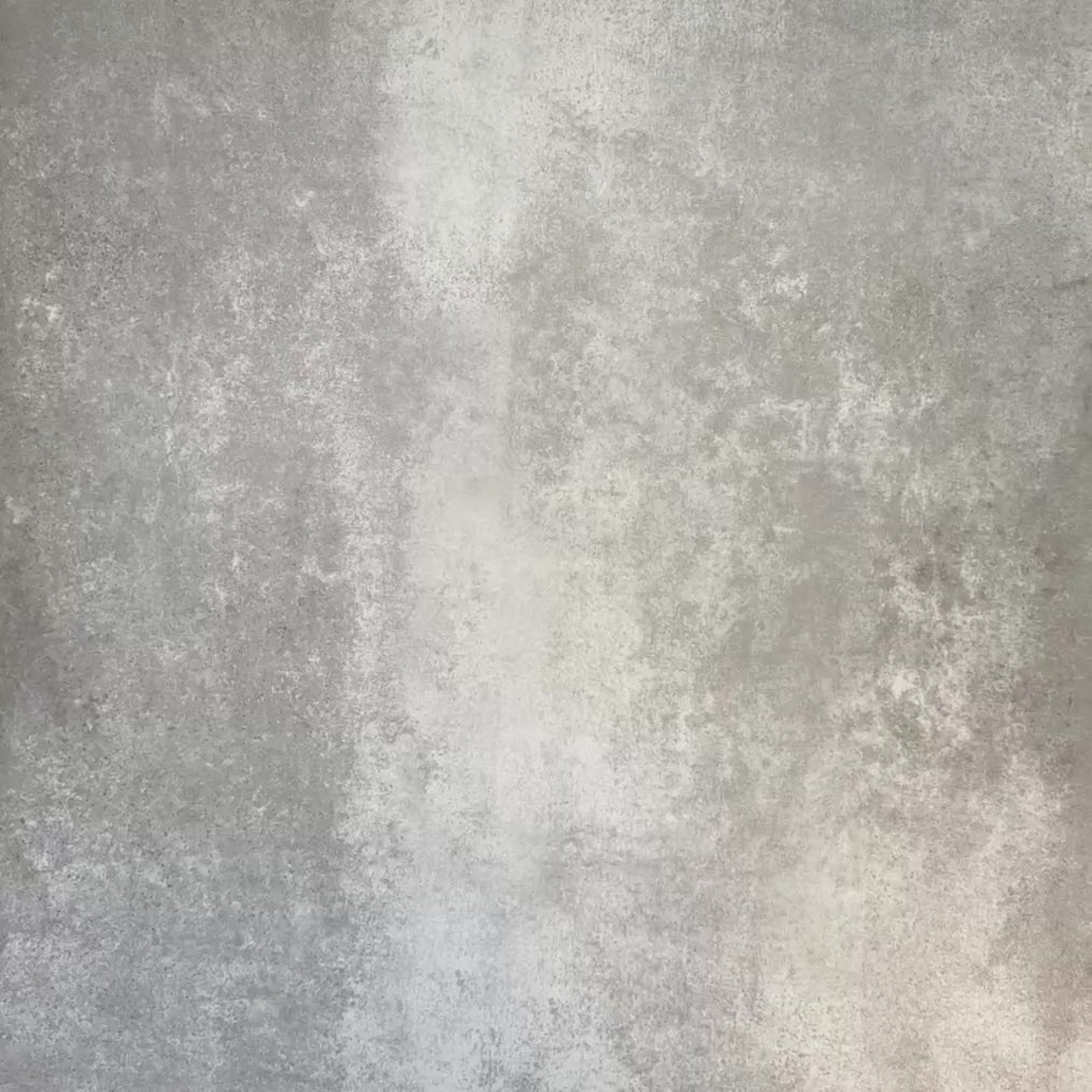 Video showcasing Almeria Giza Moroccan-style porcelain wall and floor tiles in a bold black and white geometric triangle design, 20x20cm, highlighting the pattern and surface detail.
