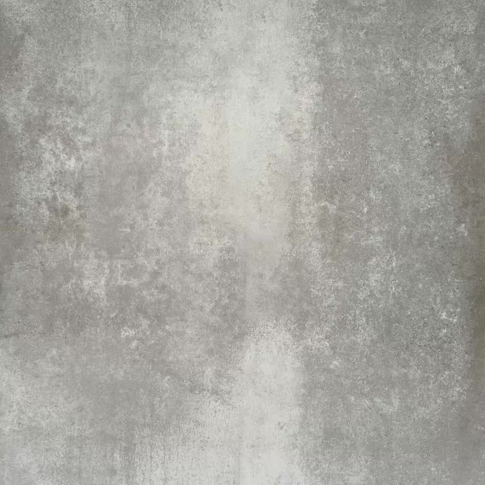 Pebbles Reversed Blue 20x20cm porcelain Moroccan-style tiles featuring bold abstract blue shapes on a soft white background, designed to create playful statement walls and contemporary patterned interiors.