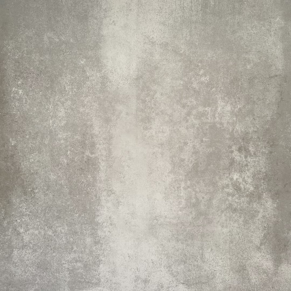 Nomad Aquamarine brick wall tiles in a 6 × 24.6cm format, featuring a glossy, lightly textured finish and soft blue-green tones, creating a modern industrial look suitable for bathrooms and kitchens.