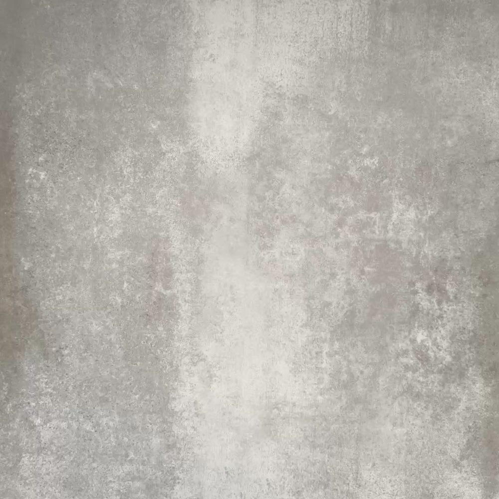 Video showcasing Nantes Rose Pink Moroccan-style patterned tiles laid in a seamless layout, showcasing soft pink floral motifs, cream circular medallion details, and mosaic-inspired geometric accents in muted neutrals and deep burgundy tones. The 20x20cm encaustic-style tiles create a decorative, vintage-inspired surface ideal for floors or feature walls.