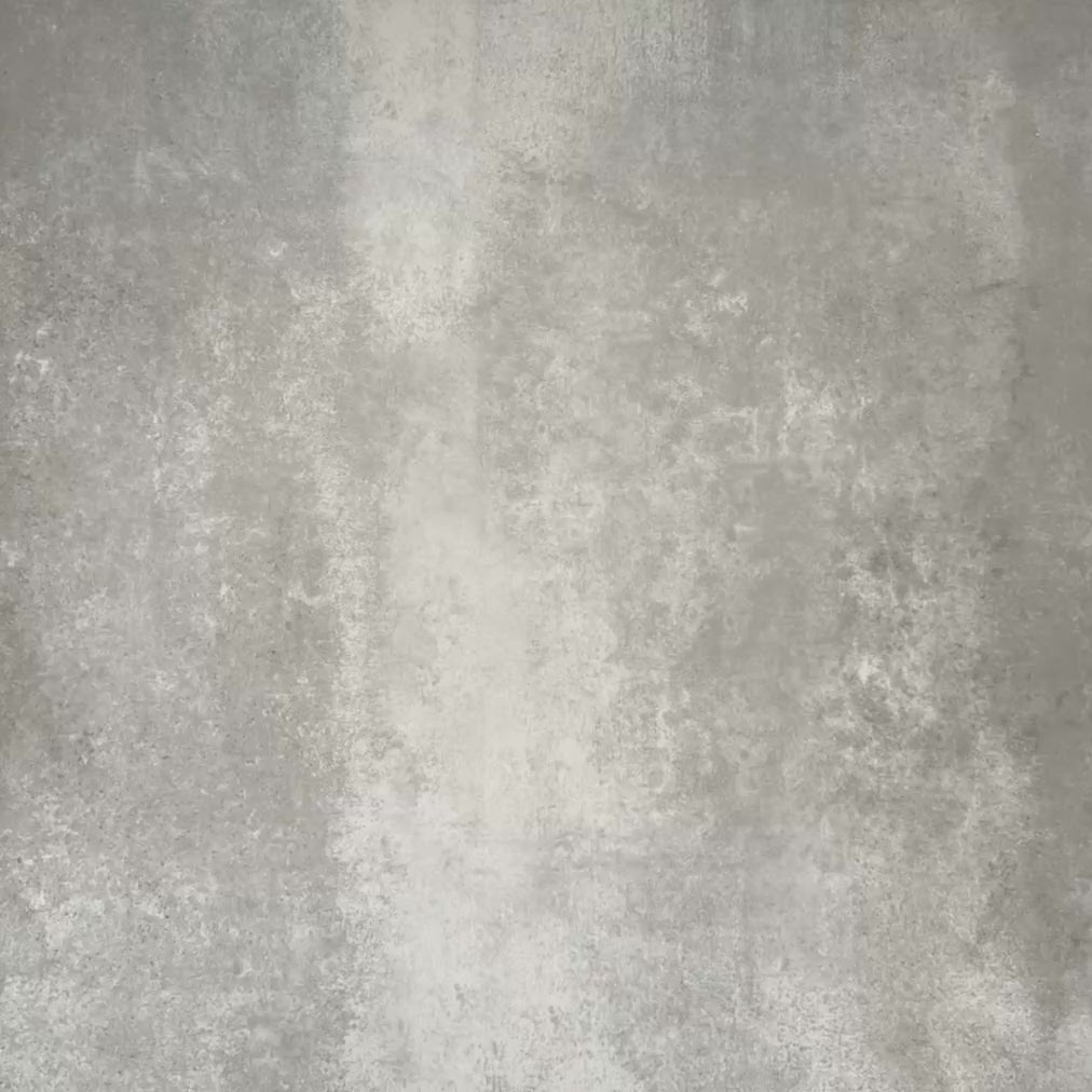 Video showcasing Cuba Tanane Moroccan-style porcelain tiles laid in a repeating geometric pattern, featuring deep green stars, soft pink octagons, crisp white shapes and warm brown accents across multiple 20×20cm tiles.