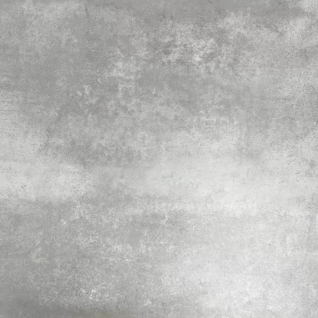 Video showcasing four Fayrouz Black 15.2x15.2cm natural marble tiles with a tumbled finish arranged together, showcasing deep charcoal tones, natural veining and surface variation against a neutral textured background.