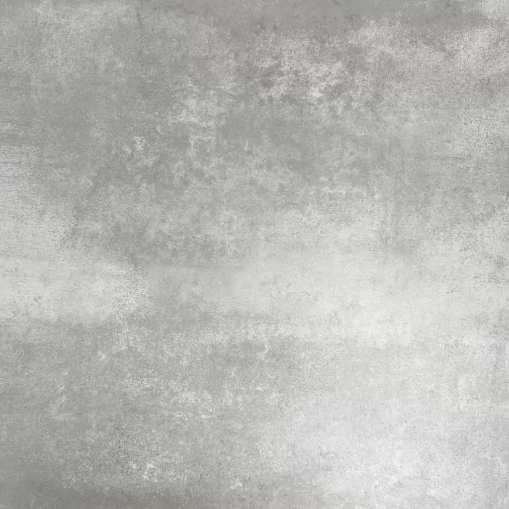Video showcasing four Fayrouz Black 15.2x15.2cm natural marble tiles with a tumbled finish arranged together, showcasing deep charcoal tones, natural veining and surface variation against a neutral textured background.