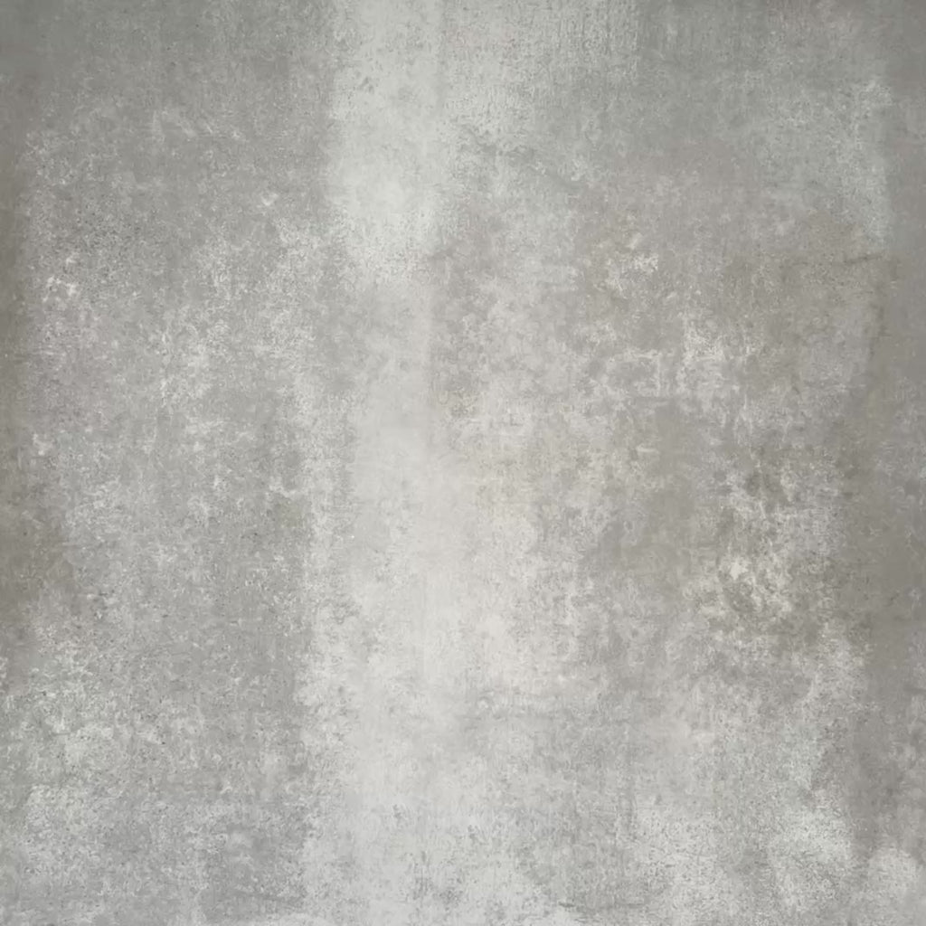 Video showcasing Abstract Illusion Verde Noir Patterned Tiles in a 20x20cm format, displayed in a repeated grid layout to showcase the bold optical illusion design. Deep black and rich green curved shapes contrast with a soft neutral background, creating a striking, high-impact pattern ideal for feature walls, floors or decorative splashbacks.