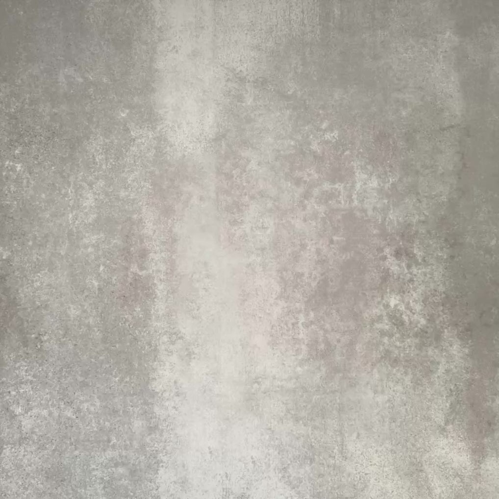 Video showcasing Cuba Paradise Moroccan-style porcelain tiles in a 20×20cm square format, arranged in a repeating floral pattern with coral pink backgrounds, green detailing and white and brown accents, showcasing the tile’s bold symmetry and decorative encaustic-style design.