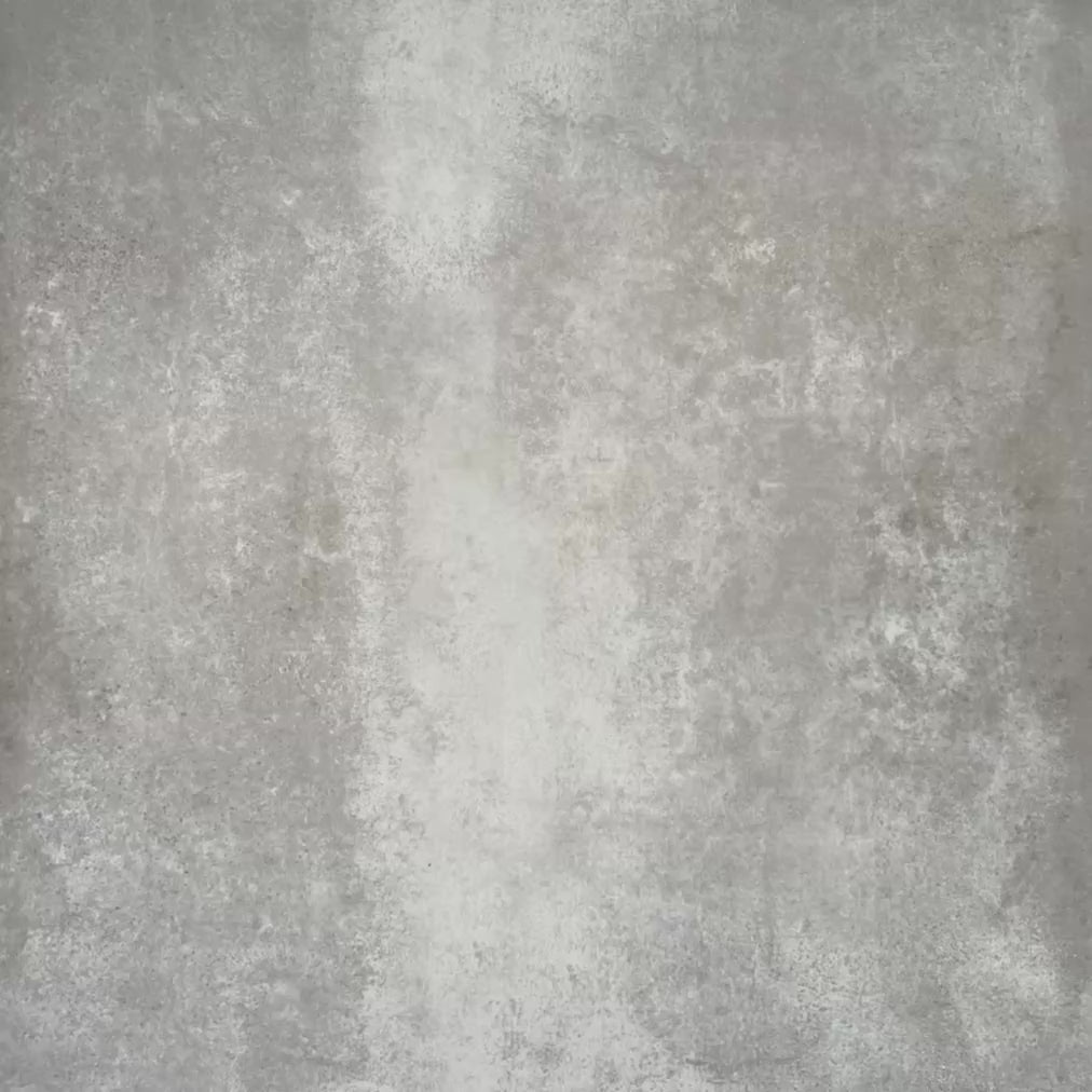 Video showcasing Viscount Heythrop 20×20cm Victorian-style porcelain wall and floor tiles laid in a repeating geometric floral pattern with circular motifs in soft grey, warm beige, taupe and muted blue tones, shown as a full tile layout highlighting the classic Victorian-inspired design.