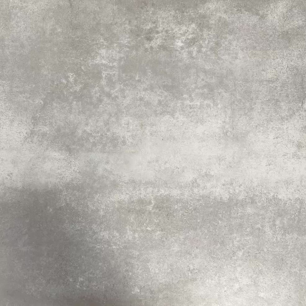 Video showcasing Fez Ocean Blue 20x20cm Moroccan-style porcelain tiles arranged as a four-tile panel, highlighting the blue, white and green geometric star pattern and the full repeat design against a textured grey background.