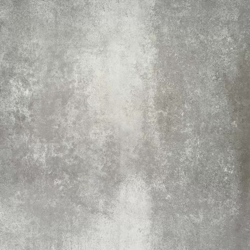 Product display of Pottery Brick Blanco 5x25cm glossy wall tiles in soft white tones, featuring handcrafted edges and subtle surface variation, shown against a textured concrete-style backdrop.