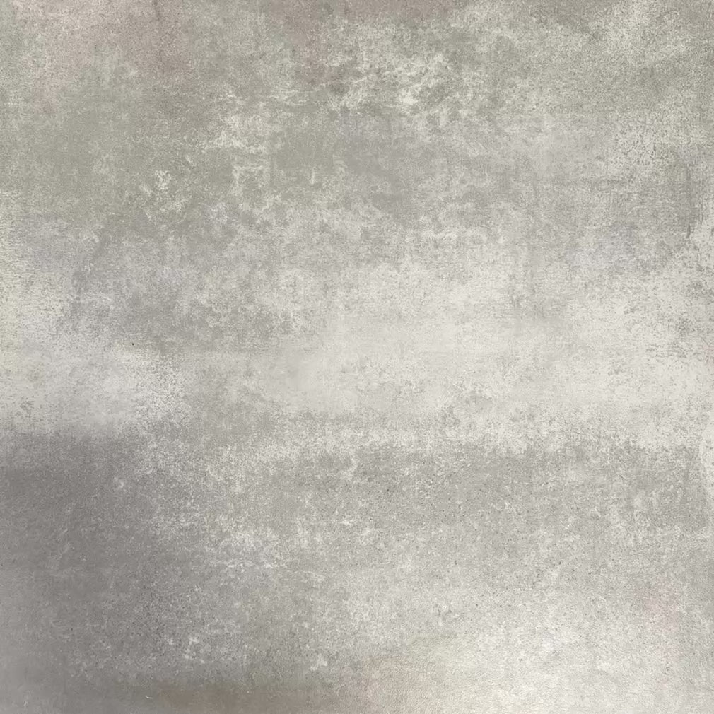 Video showcasing Fez Fiera Moroccan style porcelain tiles with a repeating geometric star pattern in soft blue, terracotta, grey and cream