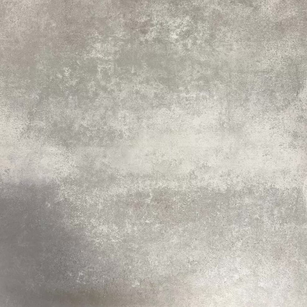 Video showcasing Fez Federal Blue 20x20cm Moroccan-style porcelain tile displayed against a textured grey background, highlighting the bold blue and white geometric star pattern with subtle pale blue detailing.