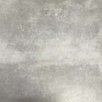 Video showcasing Fez Jade Green 20x20cm Moroccan-style porcelain tile displayed against a textured grey background, highlighting the soft green geometric star pattern and traditional encaustic-inspired design.
