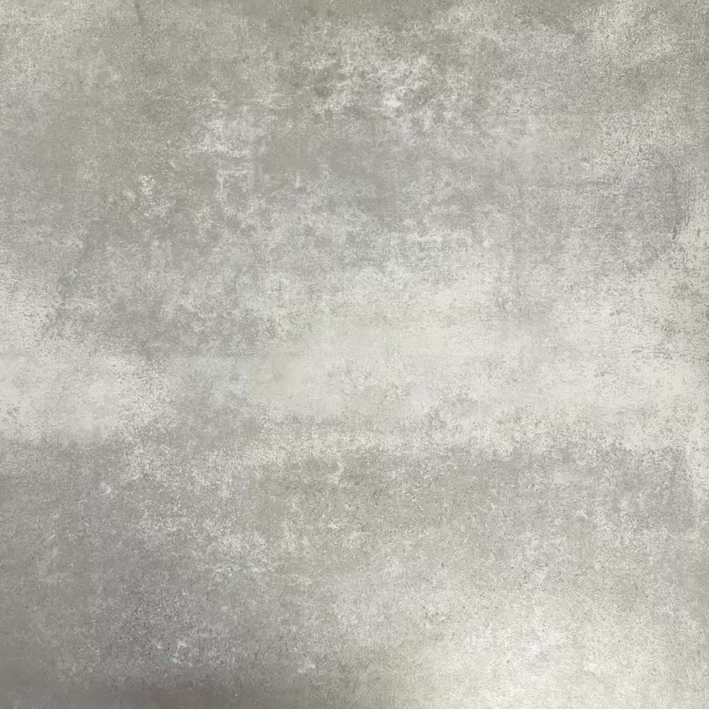 Video showcasing Fez Jade Green 20x20cm Moroccan-style porcelain tile displayed against a textured grey background, highlighting the soft green geometric star pattern and traditional encaustic-inspired design.