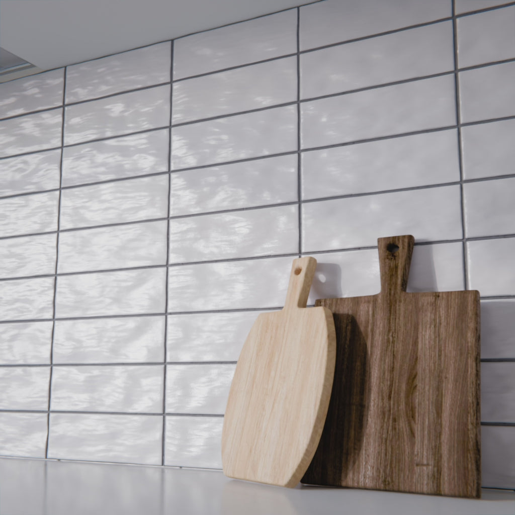 Interior scene featuring Zellige Oyster Brick Moroccan style ceramic wall tiles in 6.5cm x 20cm format, showcasing pale oyster tones with gentle variation, laid in a brick pattern for kitchens, splashbacks or bathroom walls.