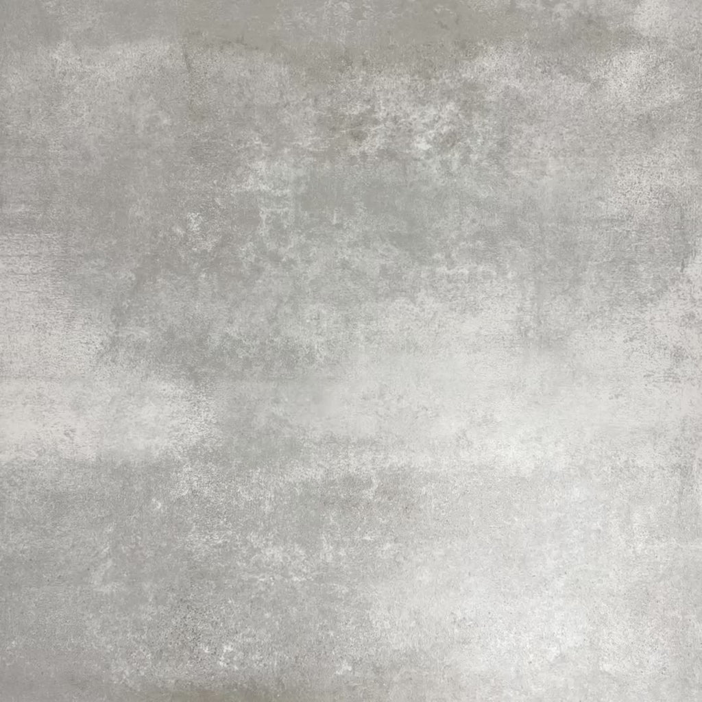 Video showcasing four Fayrouz Rosso 15.2x15.2cm natural marble tiles with a tumbled finish arranged together, showcasing warm red tones, distinctive veining and natural variation against a neutral textured background.