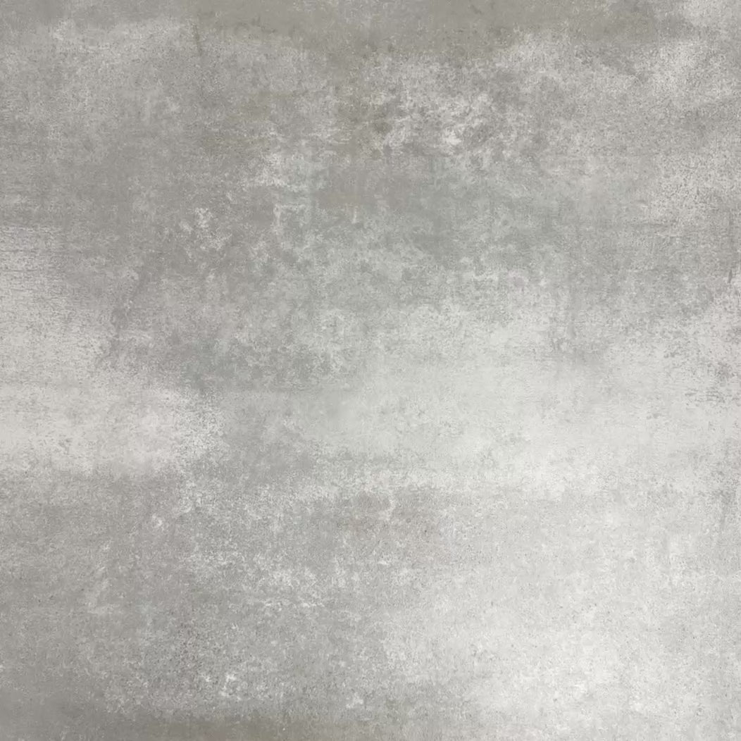 Video showcasing four Fayrouz White 15.2x15.2cm natural marble tiles with a tumbled finish arranged together, showcasing soft white tones, subtle veining and natural variation against a neutral textured background.