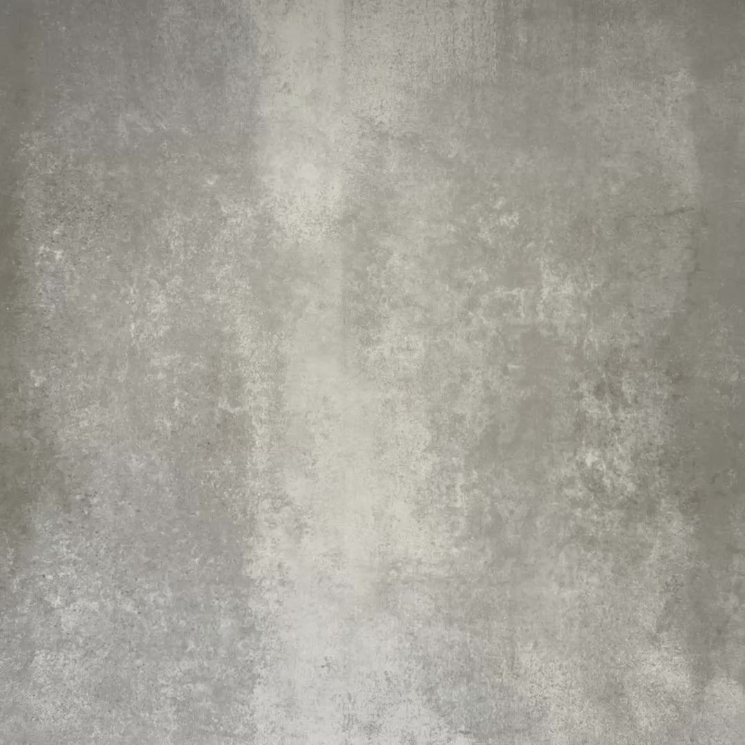 Video showcasing Abstract Circles Patterned Tiles in a 20x20cm format, shown in a repeating grid layout to highlight the bold circular design. Deep green, charcoal and soft cream tones create a striking yet balanced pattern, styled with floral accents to showcase the tiles as a decorative feature suitable for floors, walls or splashbacks.