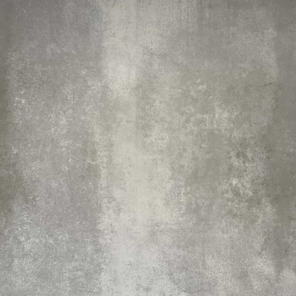 Video showcasing Abstract Circles Patterned Tiles in a 20x20cm format, shown in a repeating grid layout to highlight the bold circular design. Deep green, charcoal and soft cream tones create a striking yet balanced pattern, styled with floral accents to showcase the tiles as a decorative feature suitable for floors, walls or splashbacks.