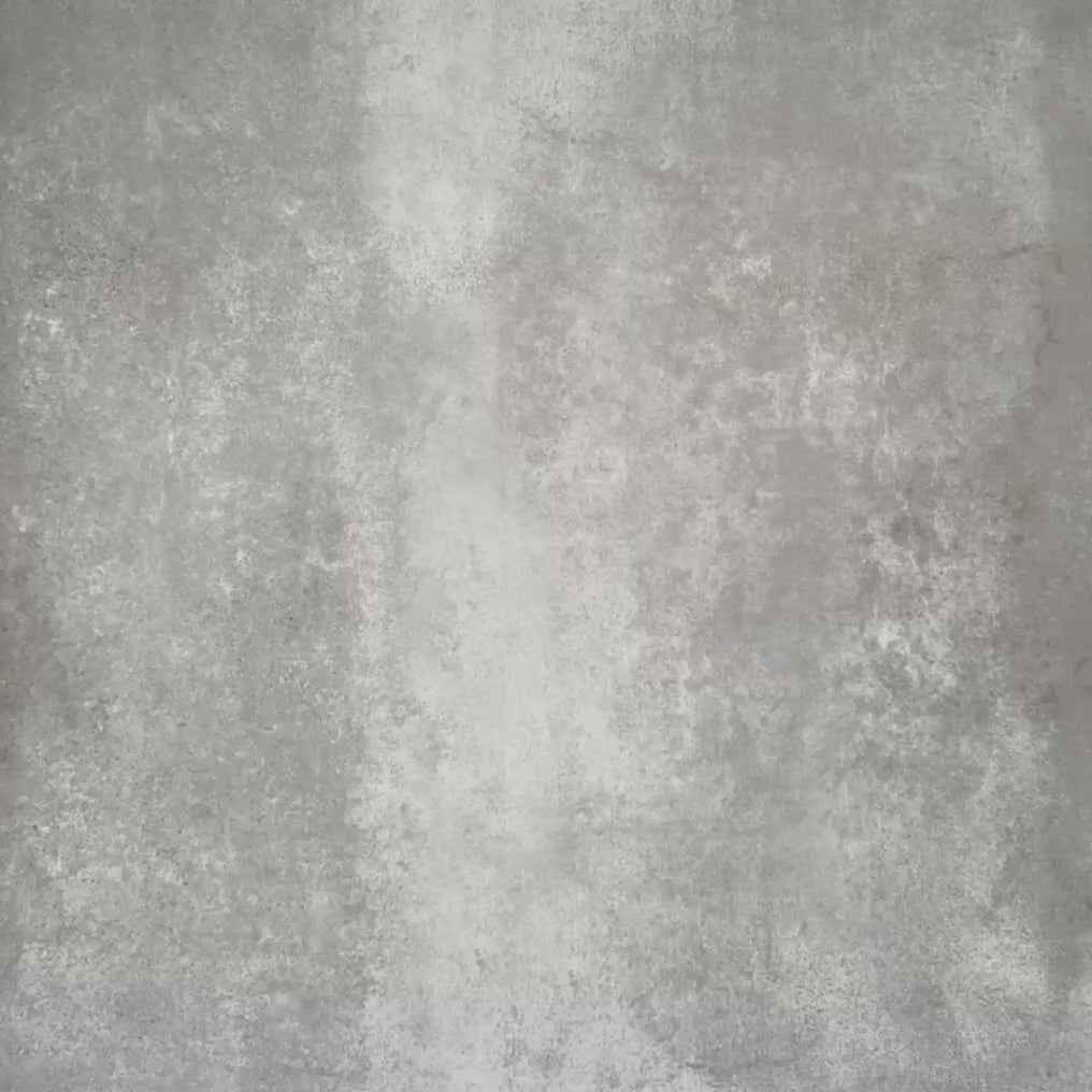 Video showcasing Viscount Turner 20×20cm Victorian-style porcelain wall and floor tiles laid in a repeating geometric pattern with cross and floral-inspired motifs in soft blue, white, grey and warm beige tones, shown as a full tile layout with subtle tonal variation and floral styling.