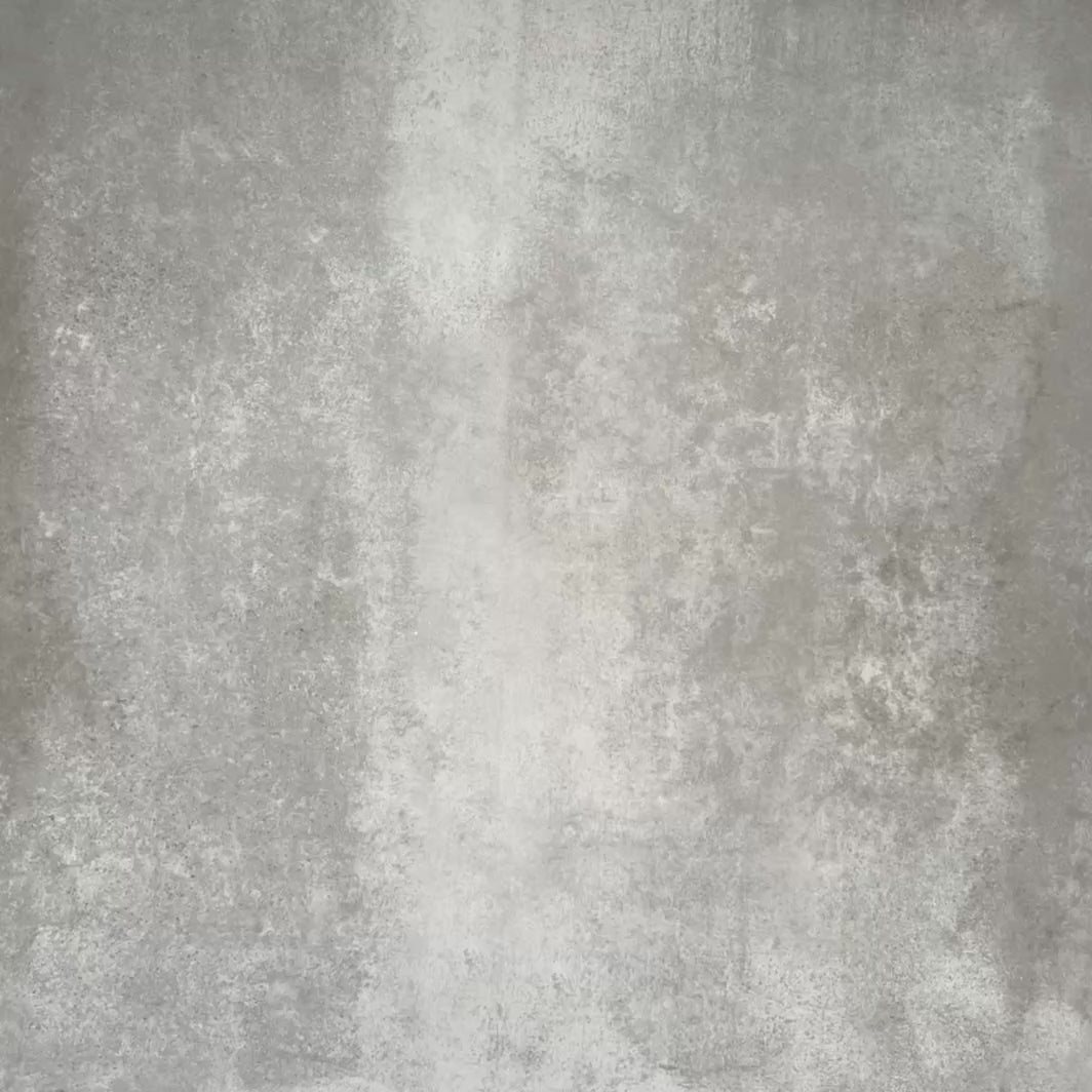 Video showcasing Abstract Illusion Verde Noir Patterned Tiles in a 20x20cm format, displayed in a repeated grid layout to showcase the bold optical illusion design. Deep black and rich green curved shapes contrast with a soft neutral background, creating a striking, high-impact pattern ideal for feature walls, floors or decorative splashbacks.