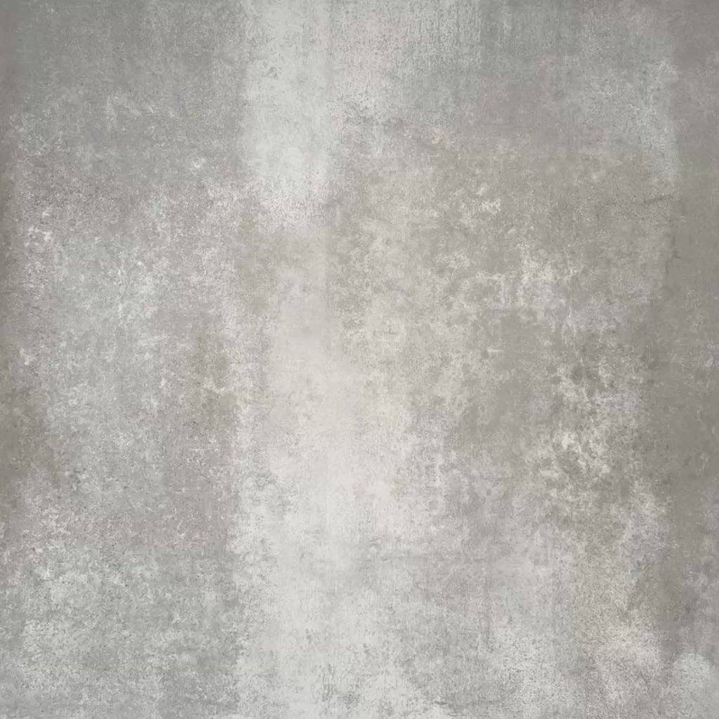 Video showcasing Clara Azul Victorian Moroccan-style porcelain tiles in a 20 × 20cm format, highlighting the blue and white geometric pattern and decorative encaustic-effect design when laid together.