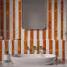 Bathroom setting featuring Saigon Amber Brick and Saigon White Brick 5.1x16.1cm Moroccan style wall tiles, installed in a stacked layout, showcasing warm amber and soft white tones, paired with contemporary fittings and a refined finish.
