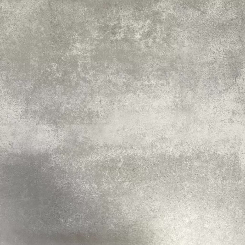 Video showcasing Fez Rosso Moroccan-style porcelain tile, highlighting the intricate geometric pattern in full detail. Deep terracotta and earthy red tones radiate from the centre, layered with soft blush pink star motifs and set against a muted grey background. The balanced, symmetrical design draws inspiration from traditional Moroccan tilework while the porcelain finish keeps it practical and durable. A bold yet elegant choice, ideal for creating feature floors.