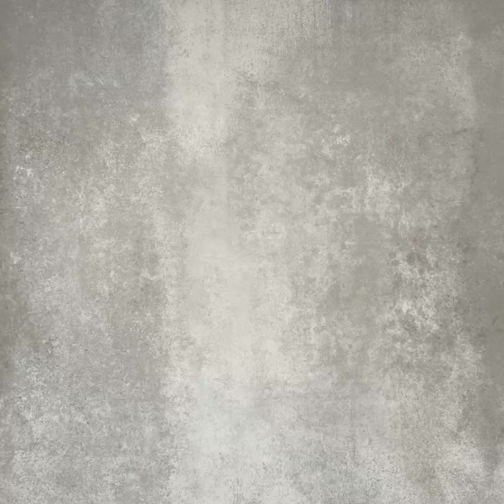 Video showcasing Cuba Havana Moroccan-style porcelain tiles in a 20×20cm square format, arranged in a geometric pattern featuring navy backgrounds with pink, green and mustard detailing, highlighting the tile’s bold symmetry, intricate motifs and decorative encaustic-style design.