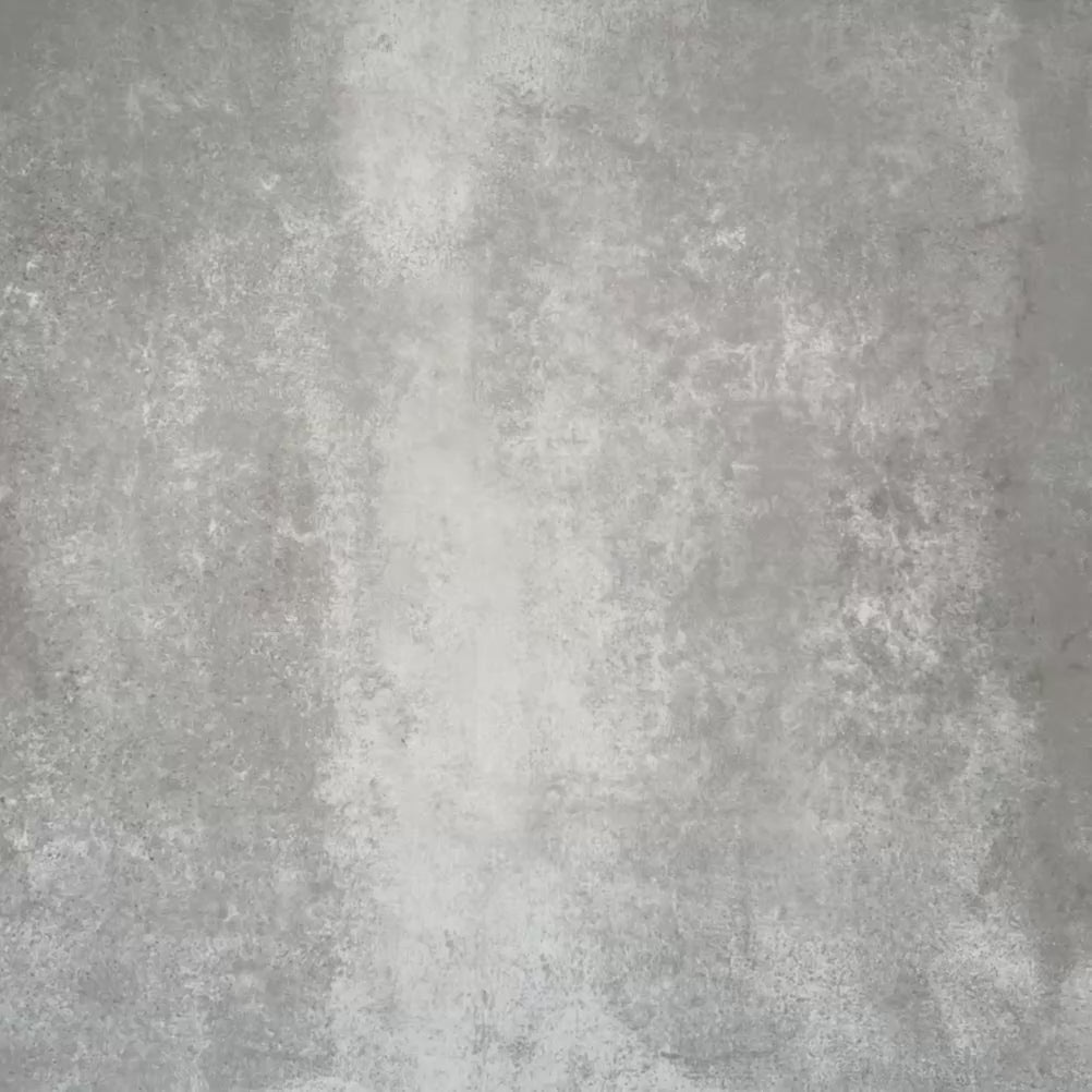 Video showcasing Viscount Sapphire 20×20cm Victorian-style porcelain wall and floor tiles laid in a repeating blue and white geometric pattern, shown as a full tile layout with octagonal motifs and subtle tonal variation, styled with white floral accents.