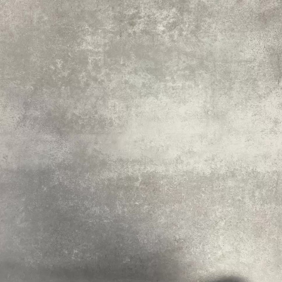 Video showcasing four Fayrouz Burgundy Red 15.2x15.2cm natural marble tiles with a tumbled finish arranged together, showcasing rich red tones, natural veining and surface variation against a neutral textured background.