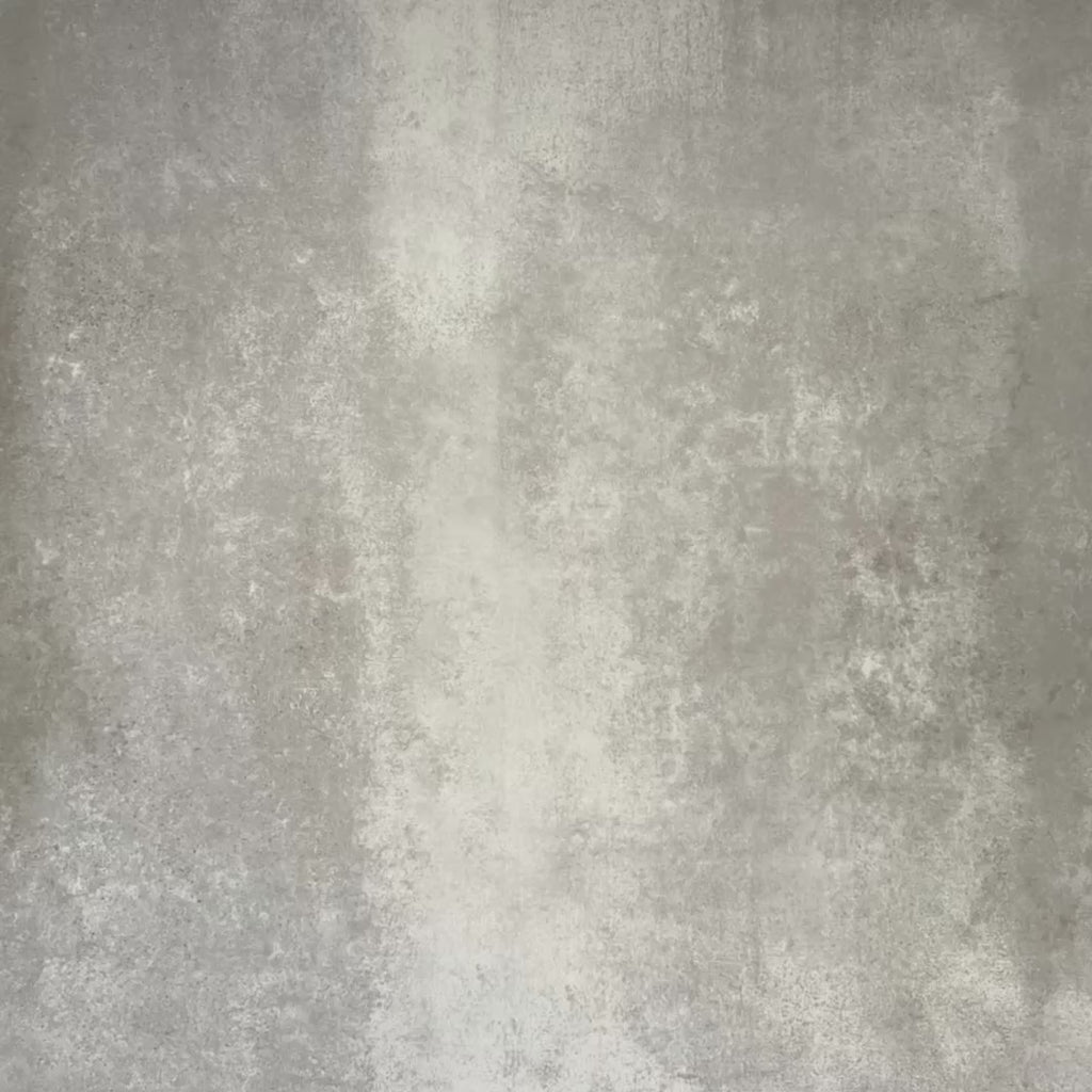 Video showcasing Abstract Lagoon Patterned Tiles in a 20x20cm format, displayed in a repeated grid layout to highlight the bold geometric zigzag design. Deep teal, soft pink and charcoal tones create a striking, contemporary pattern, styled with floral accents to showcase the tiles as a decorative feature suitable for walls, floors or splashbacks.